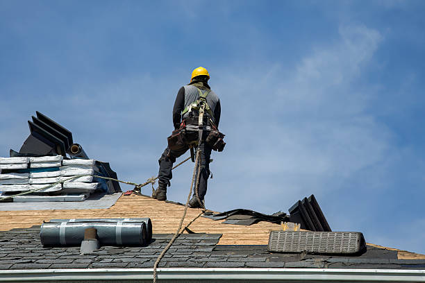 Professional Roof Replacement technician working in Salem, IN